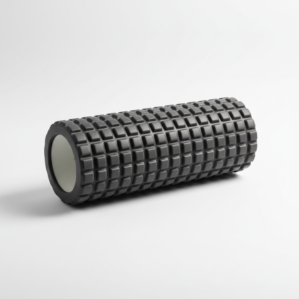 Dark grey textured EVA foam roller on a white background